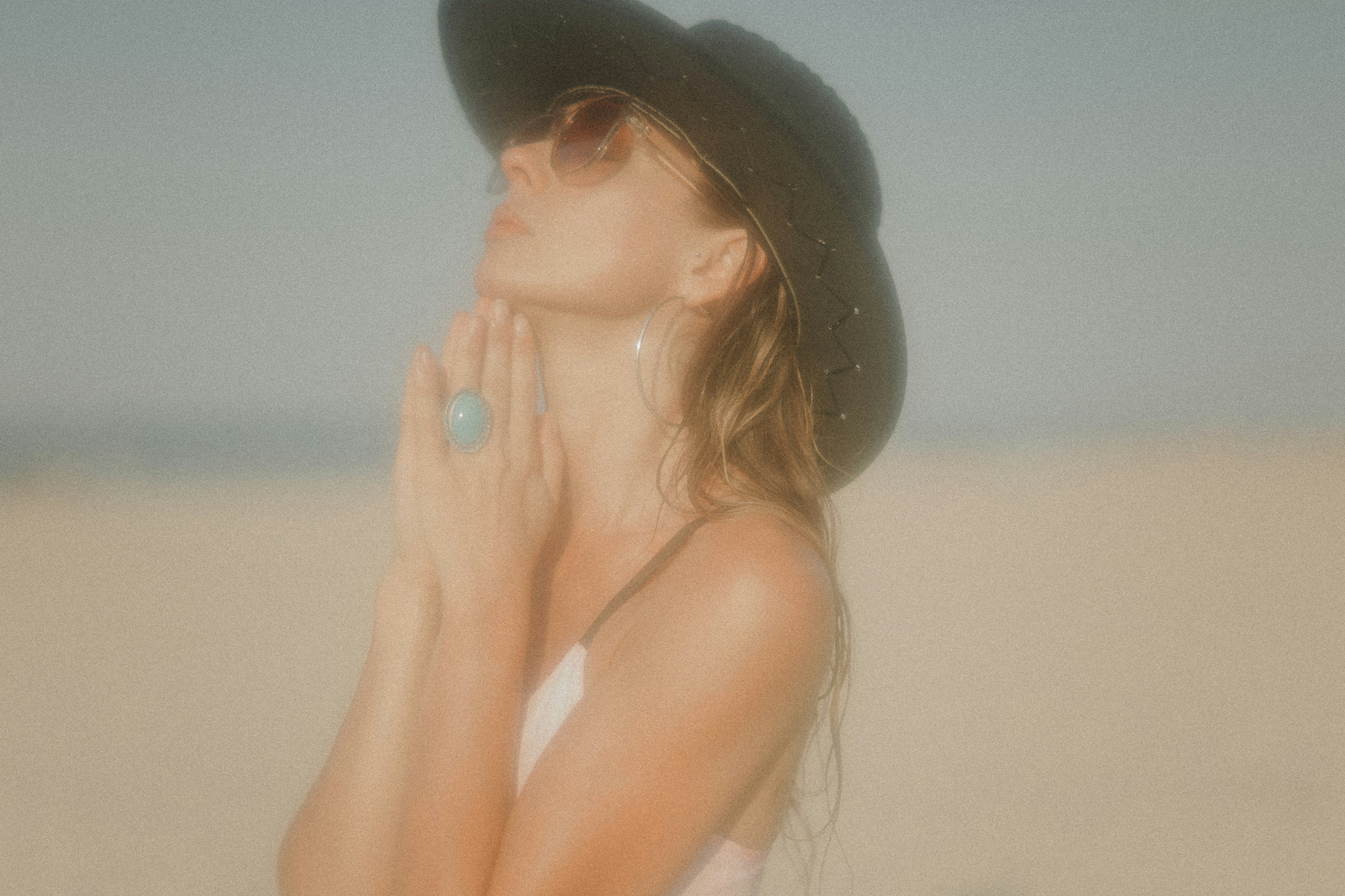 Lady with a sunhat on in the sun